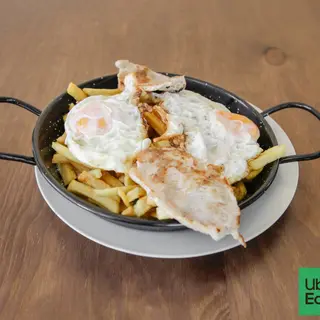 Huevos rotos con Lomo