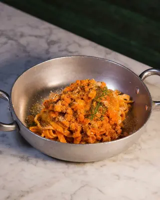 Tagliatelle con ragù rosso di calamari