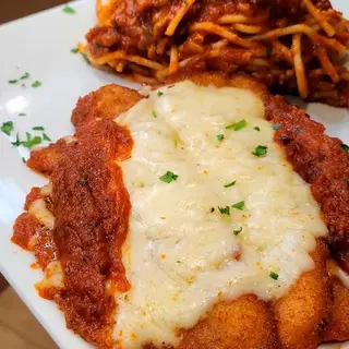 milanesa de pollo con salsa de champiñones
