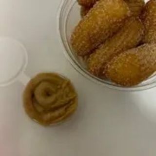 Porcao de churros com recheio a escolha
