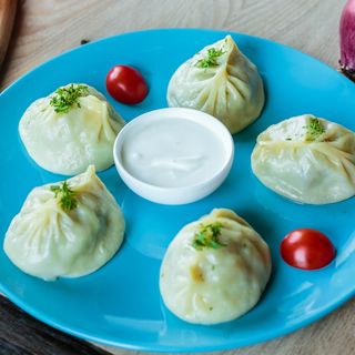 Манты с говядиной и тыквой