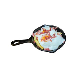 Huevos rotos con virutas de jamón serrano