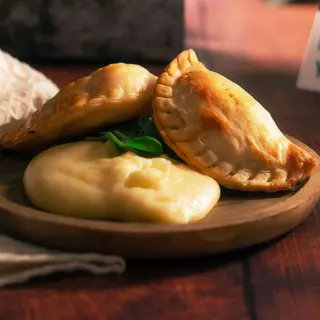 Empanada de espinaca con queso ricotta y nueces