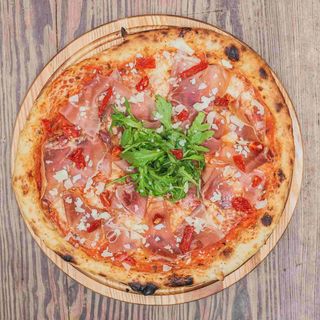 Піца прошутто крудо
