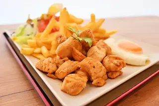 Plato De Pechuga De Pollo Marinada