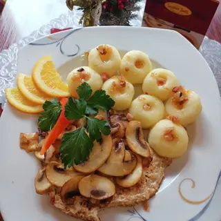 Schab z pieczarkami