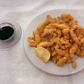 Trocitos de pollo rebozados con ajo 