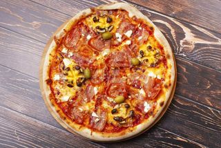 Capone pizza special 32cm + Coca cola 0.33