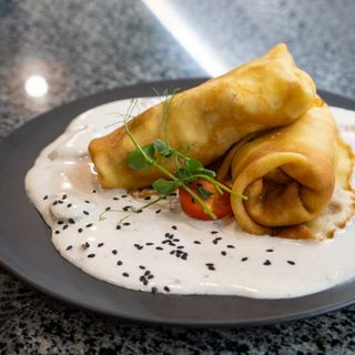 Млинці з куркою та грибною підливою (200г)