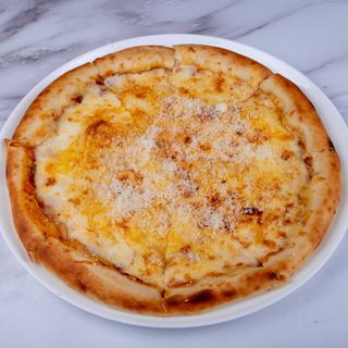 Пицца "Четыре сыра"