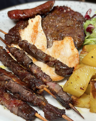 Grigliata mista di carne con patate silane