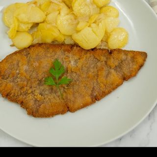 Escalope con pimientos y patatas