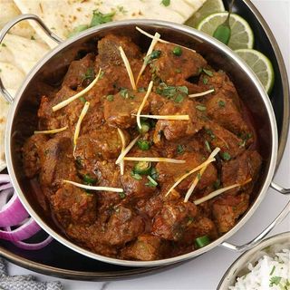 Mutton Tikka Massala Com arroz ou naan.