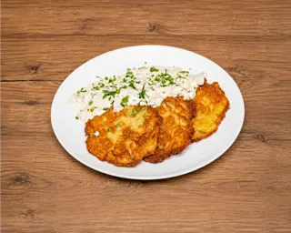 Placki ziemniaczane z sosem pieczarkowym
