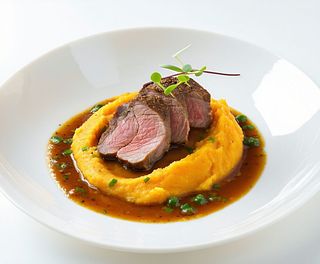 File de rață cu sos de trufe și piure din cartofi dulce