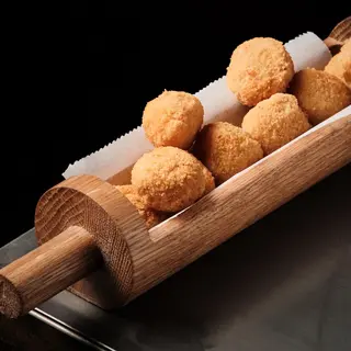 Croqueticas de prosciutto y parmesano