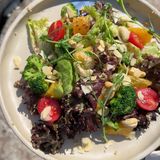 Light salad with quinoa, broccoli, and orange