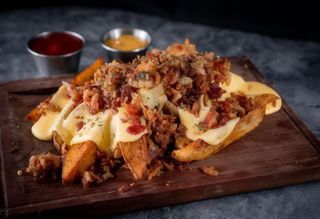 Patatas Chorreantes De Óscar