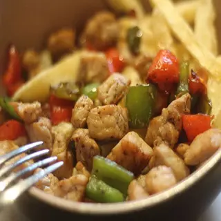 Raxo Con Pimientos Y Patatas
