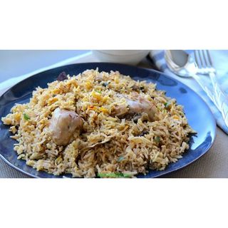 Chicken Pilau, Kachumbari and Soda 300ml