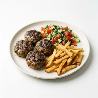 Конски кюфтета с пържени картофи и чобан салата