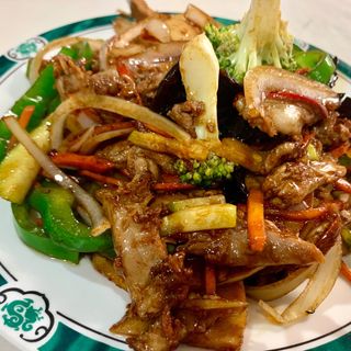 Pato salteado con verduras