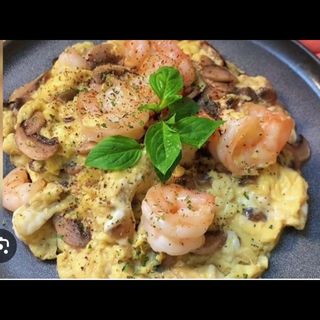 16. Revuelto champiñones y gamba