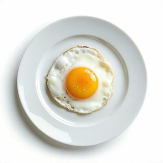 Plato De Huevos Fritos Con Patatas