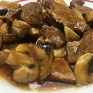 Ternera Con Champiñones