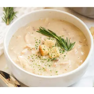 Creamy Chicken Soup Served With House Bread