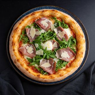Crudo e rucola
