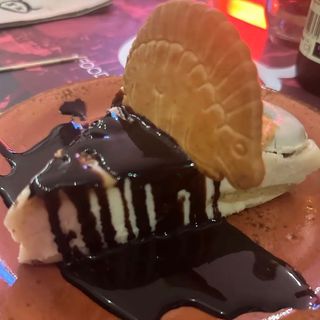 Tarta de filipinos blancos y dinosaurio