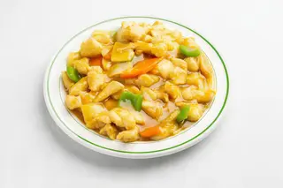 64. Pollo con salsa de curry