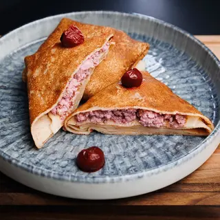Pancakes with cherries and cottage cheese