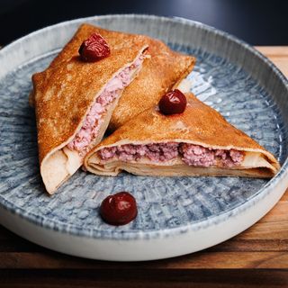Pancakes with cherries and cottage cheese