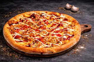 Pizza Crispy + sos gratis