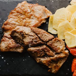 Ración de Secreto Ibérico de Cerdo a la plancha 