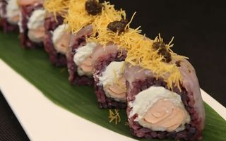 70. Black spigola roll