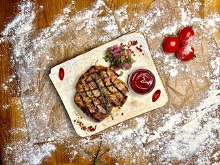 Стейк зі свиного ошийка (200/50г)