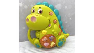 Музыкальная развивающая игрушка Динозавр
