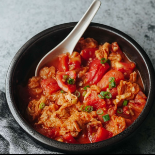 Uova strapazzate con pomodori