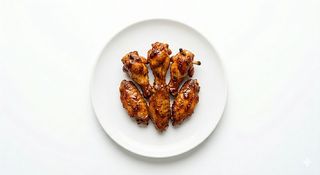 9b. Alitas de Pollo con salsa BBQ (6 Uds.)