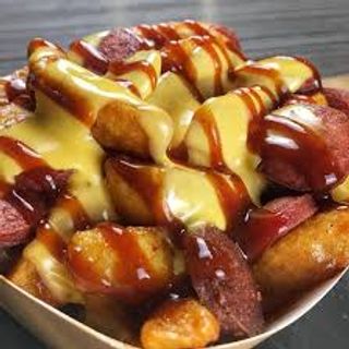 Patate con würstel e cheddar