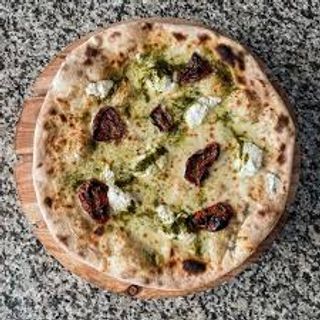 Pomodori secchi, pesto e scaglie di parmigiano