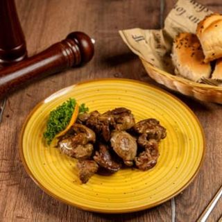 Ficaței de pui în sos de vin alb cu usturoi