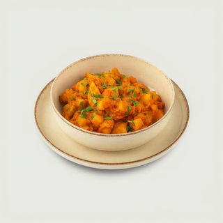 Тушкована картопля з овочами та печерицями