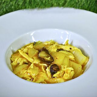 Pollo in salsa curry