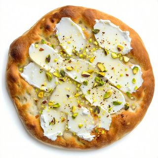 Pizza tonda stracciatella e pistacchio