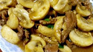 57. Ternera Con Champiñones