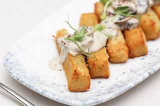 Картопляники з вершково-грибним соусом (250г)